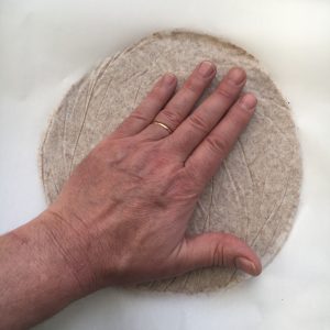 The dough being massaged with the fingers