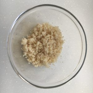 Riced cauliflower in a glass bowl